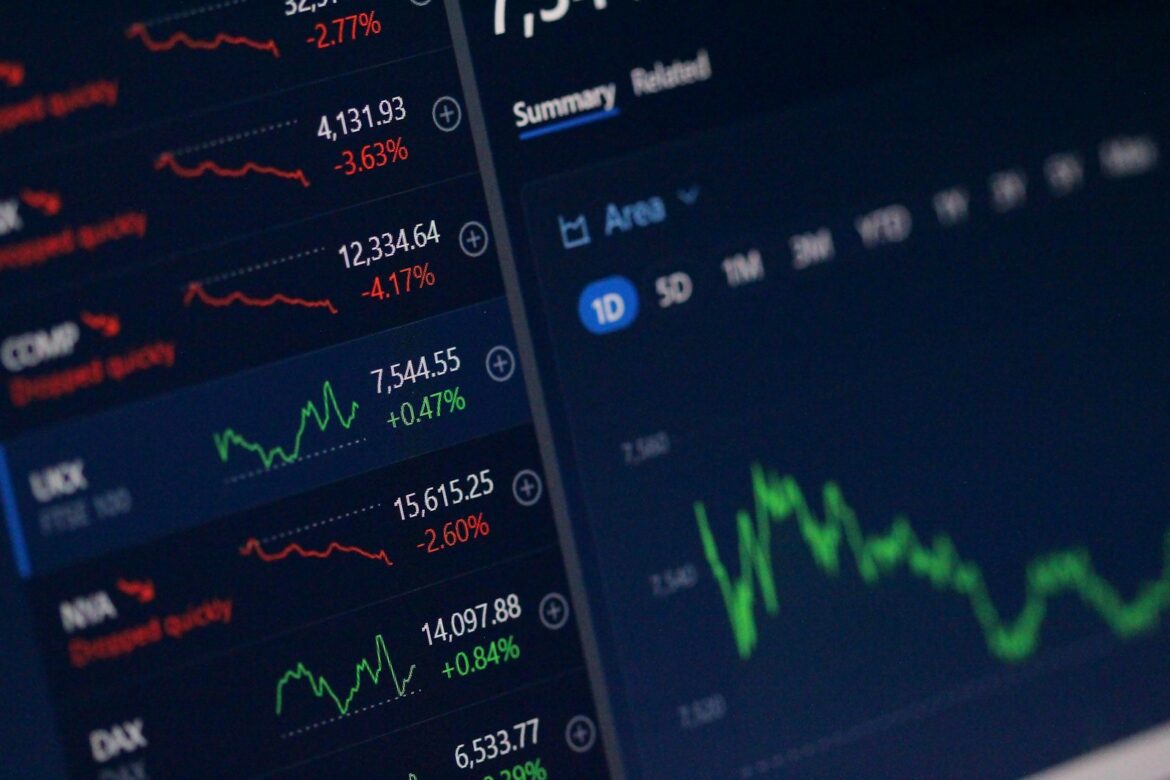 Stock market trading screens representing global financial markets