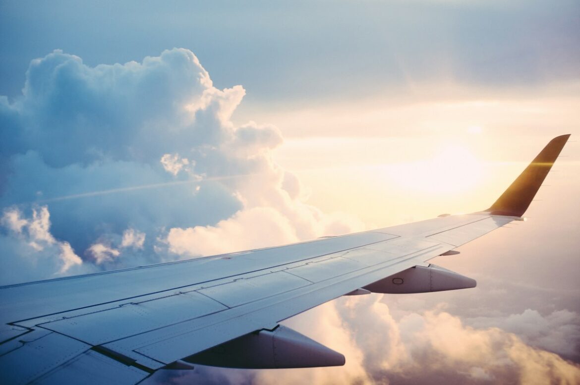 Passenger aircraft in flight illustrating an airport disruption; not a photograph of the Corendon flight.