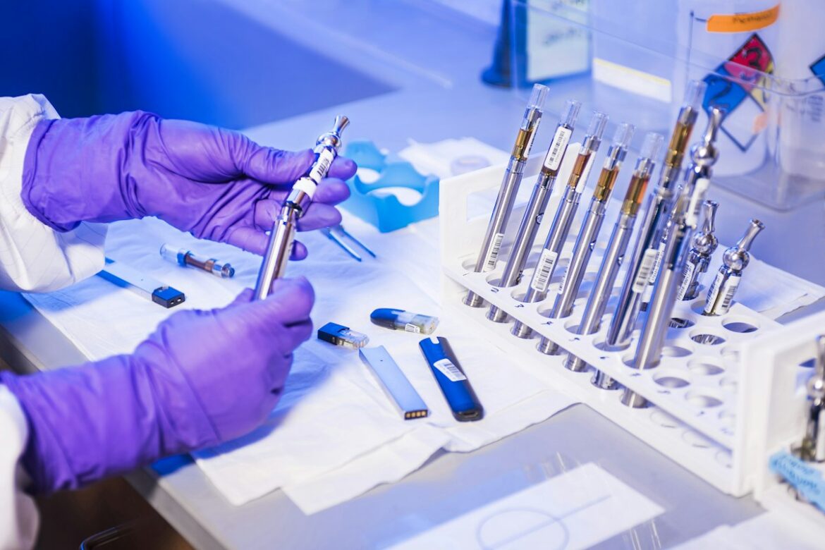 Laboratory technician working with gloved hands, illustrating public-health testing and lead exposure prevention.